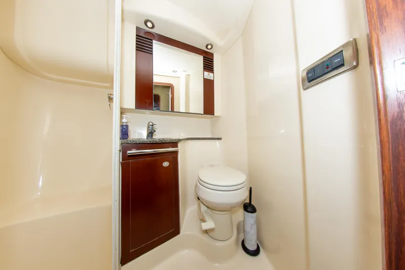  Yacht Photos Pics Luxurious bathroom in 2006 Sea Ray 44 Sedan Bridge yacht, featuring modern fixtures and elegant design.
