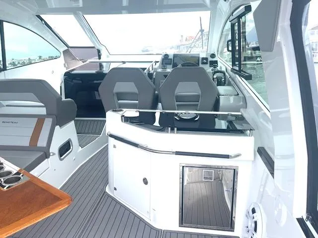 Fortuna Yacht Photos Pics Interior of 2022 Beneteau 32 Gran Turismo yacht with modern seating and sleek design.