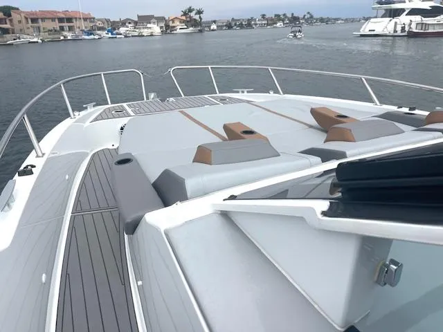 Fortuna Yacht Photos Pics 2022 Beneteau 32 Gran Turismo yacht with sleek deck design in a marina setting.