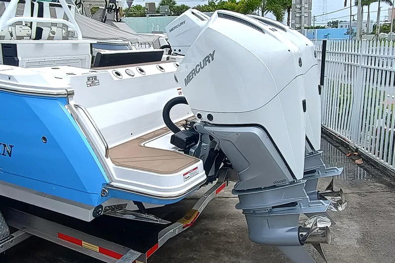 272-499 Yacht Photos Pics 2025 Blackfin 272 CC boat with dual Mercury outboard engines on a trailer.