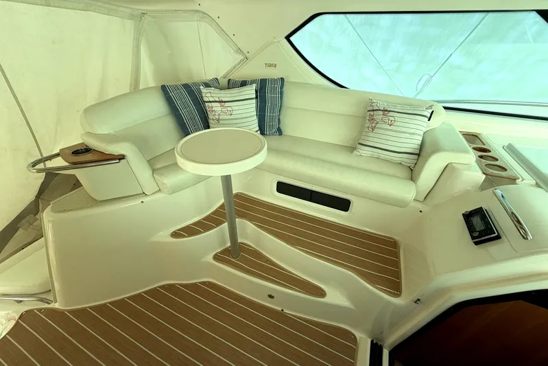  Yacht Photos Pics Luxurious interior of 2008 Tiara Yachts 4300 Sovran with plush seating and elegant decor.