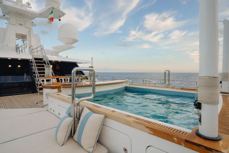 Axioma Yacht Photos Pics Luxurious 2013 Dunya Yacht deck with pool, ocean view, and elegant seating.