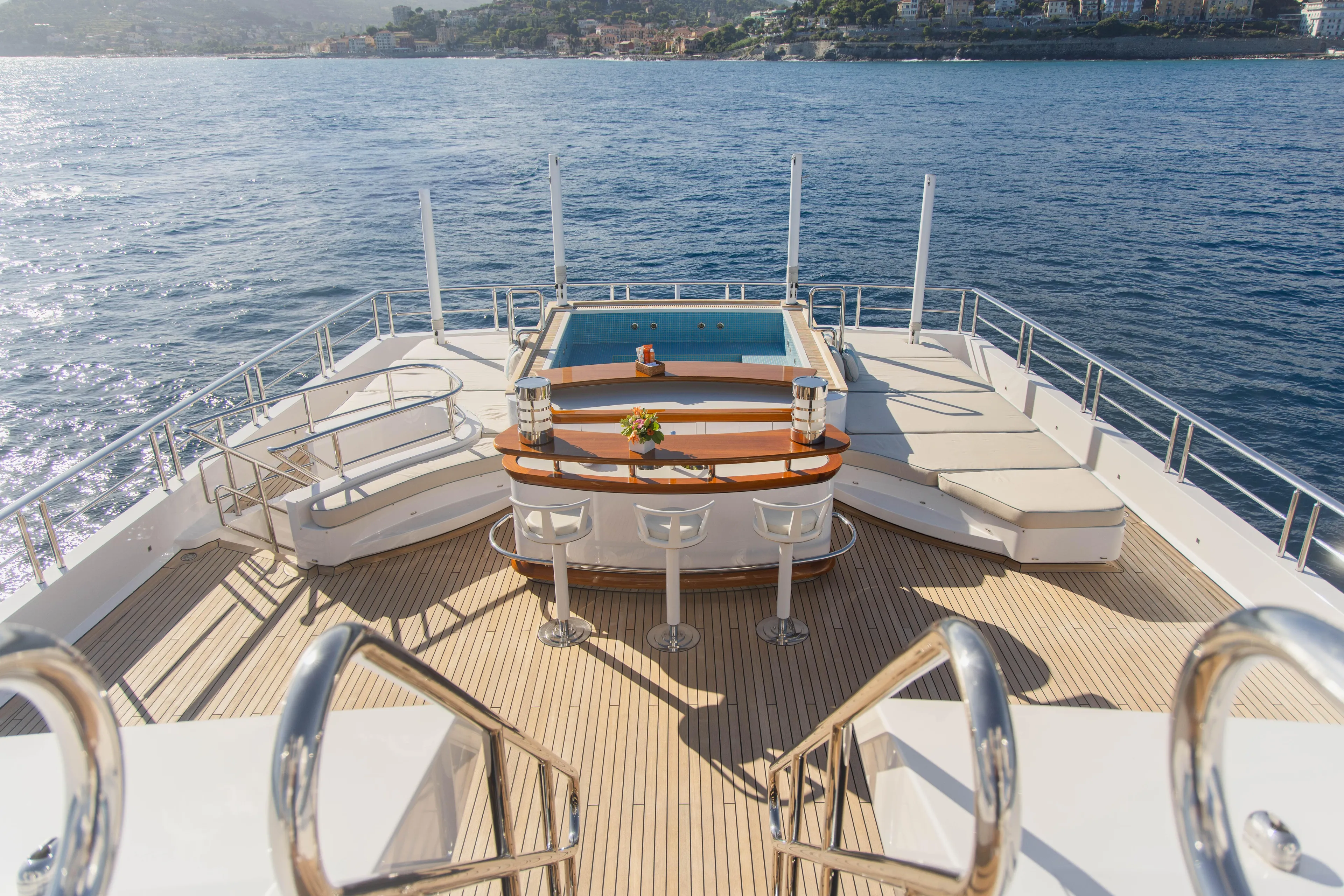 Axioma Yacht Photos Pics Luxurious 2013 Dunya Yacht deck with pool, bar, and ocean view.