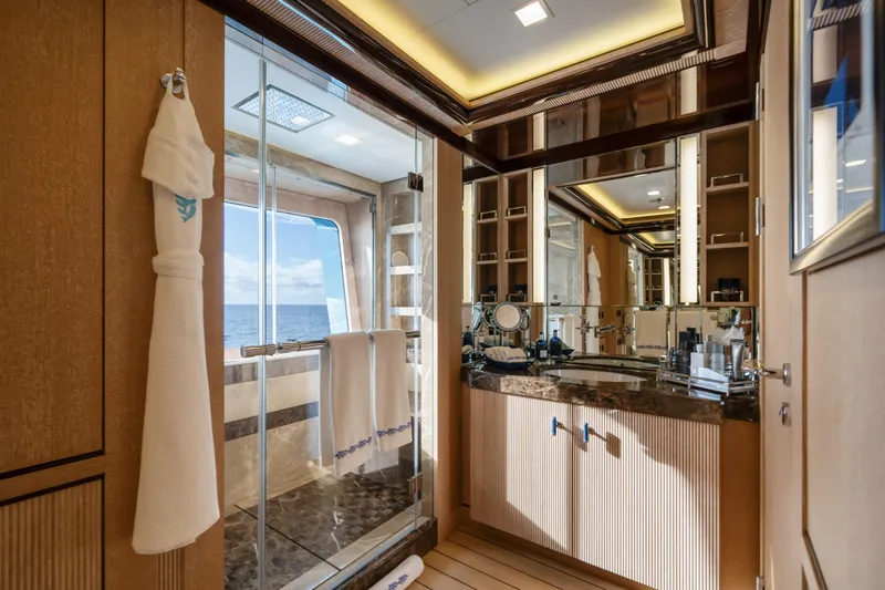 Axioma Yacht Photos Pics Luxurious bathroom on 2013 Dunya Yacht with ocean view, featuring elegant fixtures and modern design.