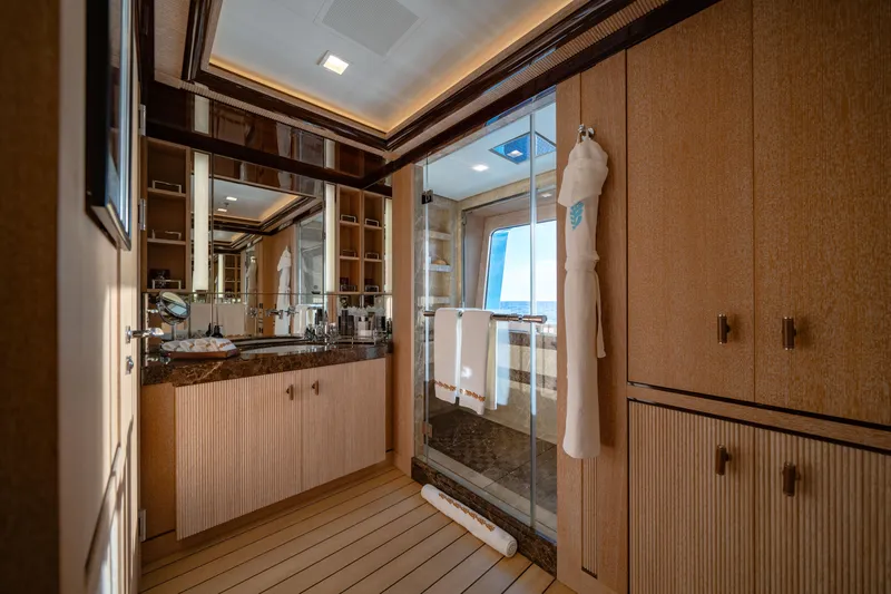 Axioma Yacht Photos Pics Luxurious 2013 Dunya Yacht bathroom with elegant wood finishes and ocean view.