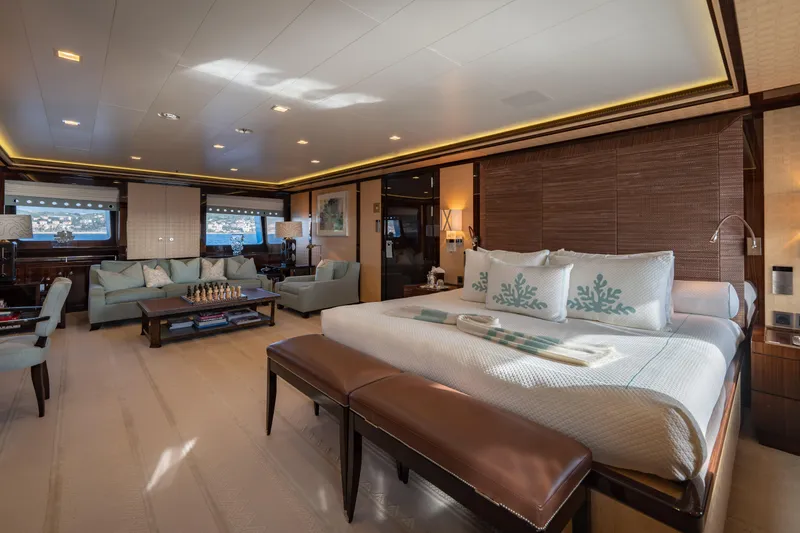 Axioma Yacht Photos Pics Luxurious interior of 2013 Dunya Yacht featuring elegant bedroom and seating area with sea views.