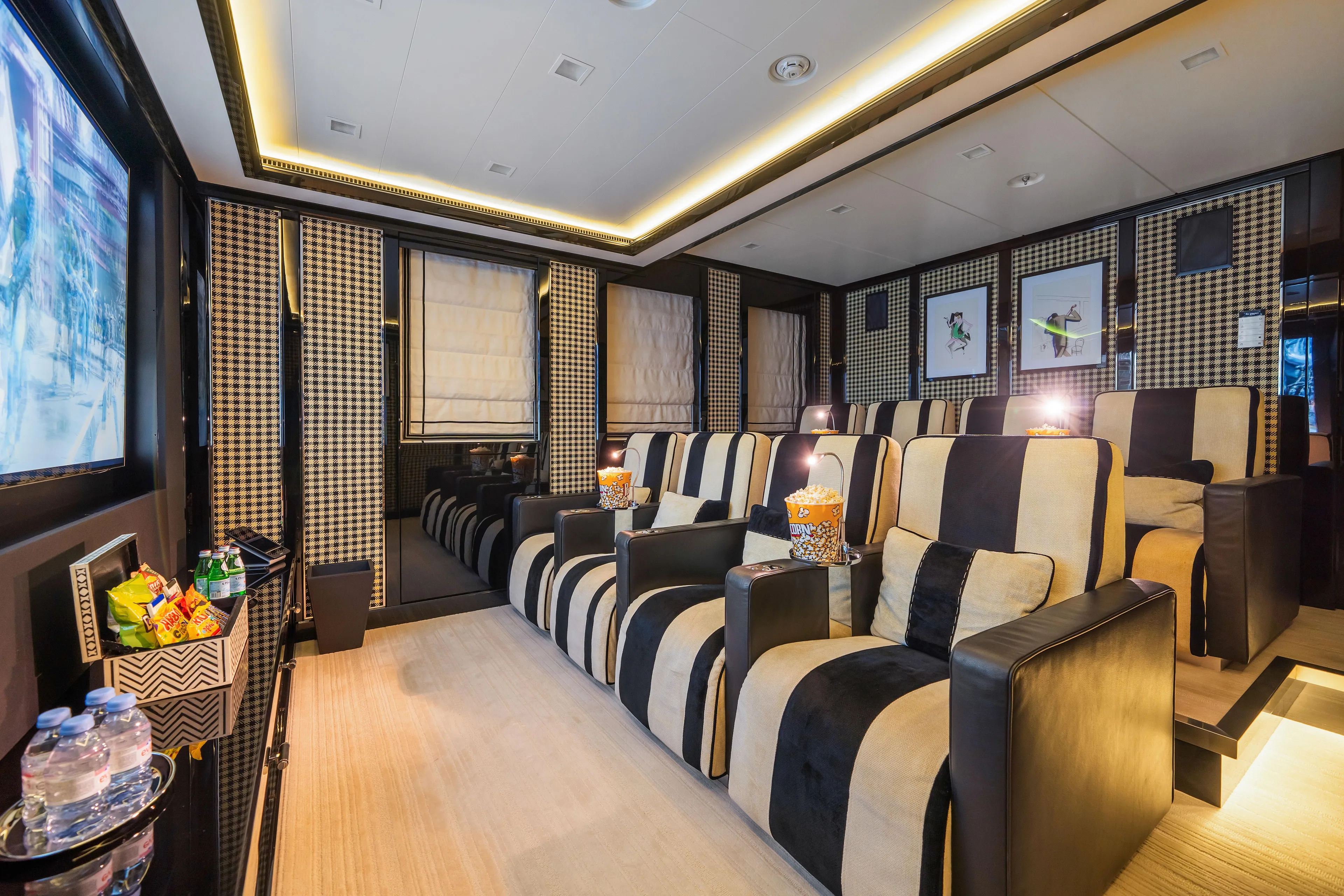 Axioma Yacht Photos Pics Luxurious 2013 Dunya Yacht cinema room with plush seating and elegant decor.