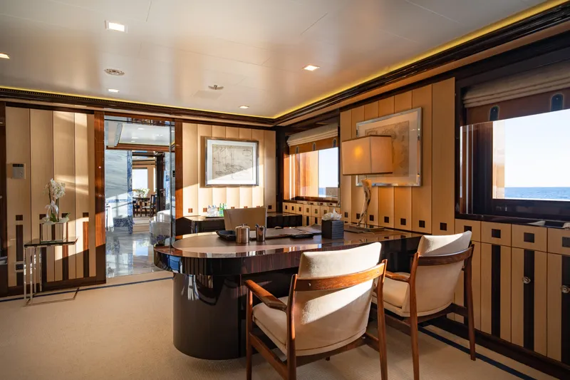 Axioma Yacht Photos Pics Luxurious interior of 2013 Dunya Yacht with elegant wood paneling and ocean view.