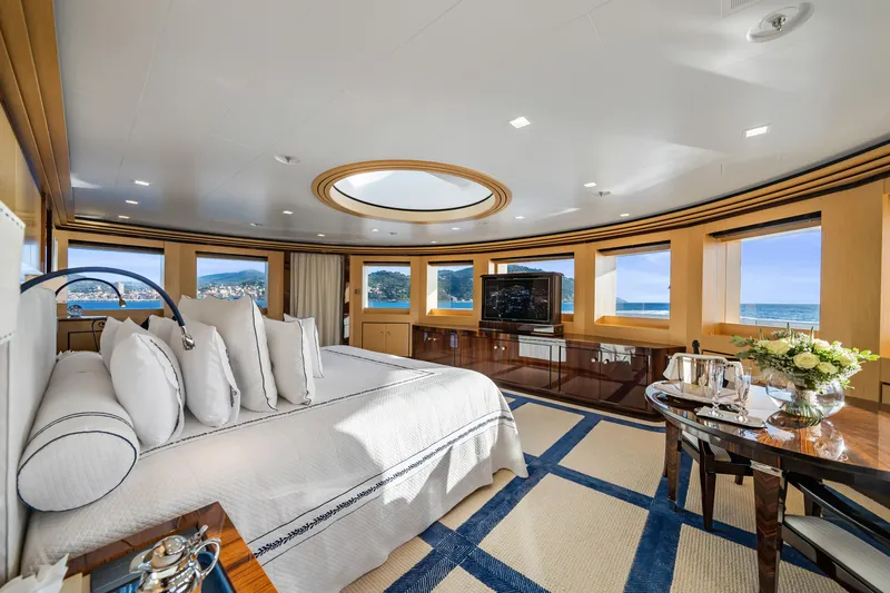 Axioma Yacht Photos Pics Luxurious 2013 Dunya Yacht bedroom with ocean views, elegant decor, and plush bedding.