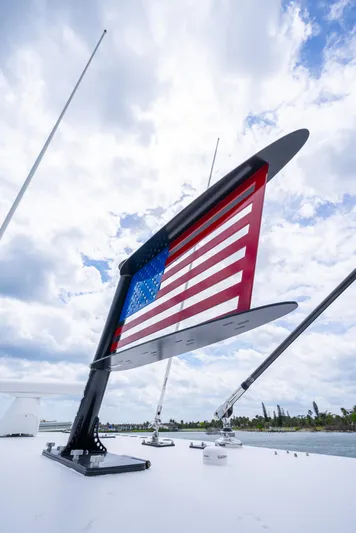 Kroppdustr Yacht Photos Pics 2023 Invincible 37 Catamaran with American flag on deck.