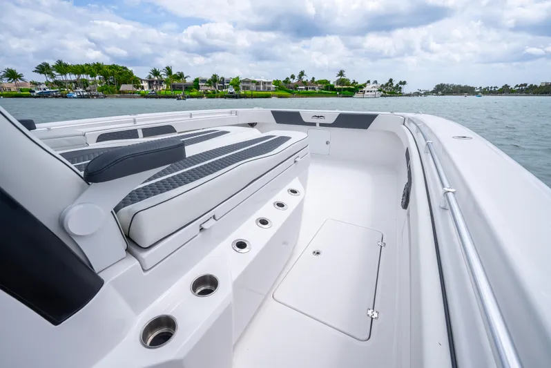 Kroppdustr Yacht Photos Pics 2023 Invincible 37 Catamaran boat interior with seating and rod holders.