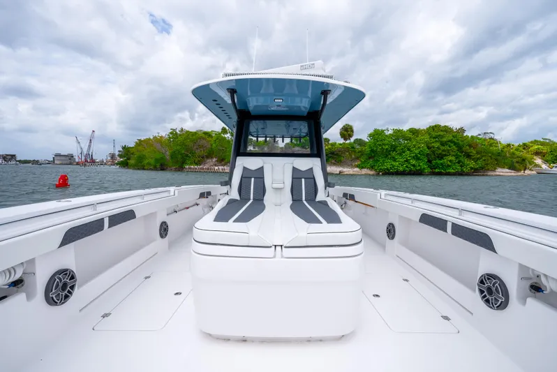 Kroppdustr Yacht Photos Pics 2023 Invincible 37 Catamaran with spacious deck and modern seating on the water.