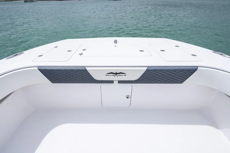 Kroppdustr Yacht Photos Pics 2023 Invincible 37 Catamaran boat deck with storage compartments.