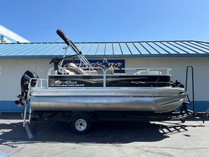 2022 Sun Tracker Bass Buggy 16 XL Select pontoon boat on trailer.