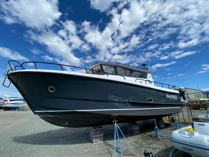 Ursa Yacht Photos Pics 2019 Sargo 36 Explorer boat on stands under a blue sky with clouds.