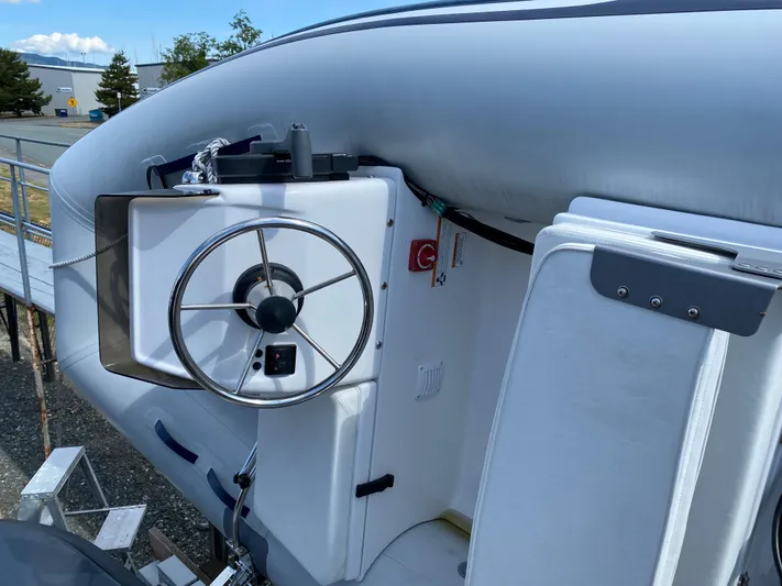 Ursa Yacht Photos Pics 2019 Sargo 36 Explorer boat helm with steering wheel and controls.