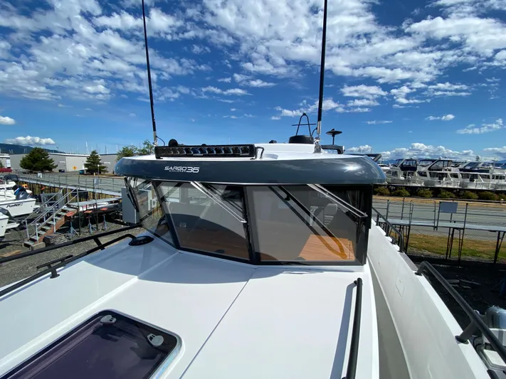 Ursa Yacht Photos Pics 2019 Sargo 36 Explorer boat with sleek design, docked under a bright blue sky.