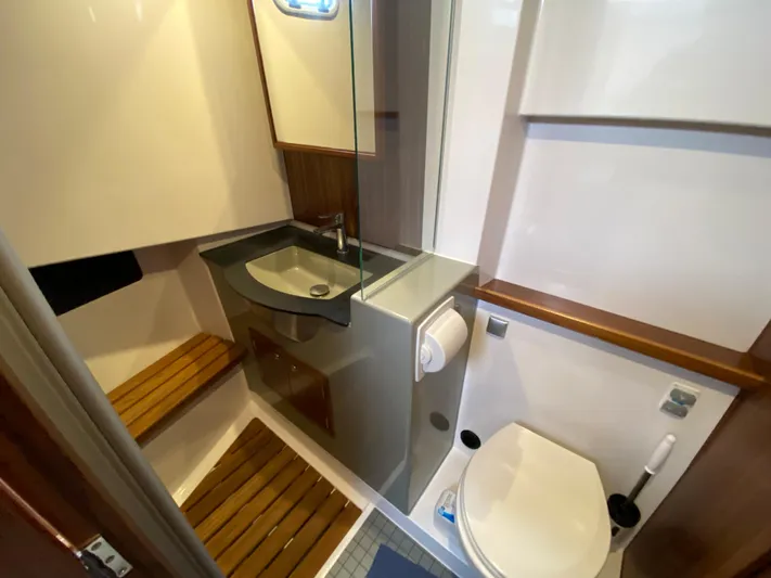 Ursa Yacht Photos Pics Bathroom interior of 2019 Sargo 36 Explorer yacht with modern fixtures and wooden accents.