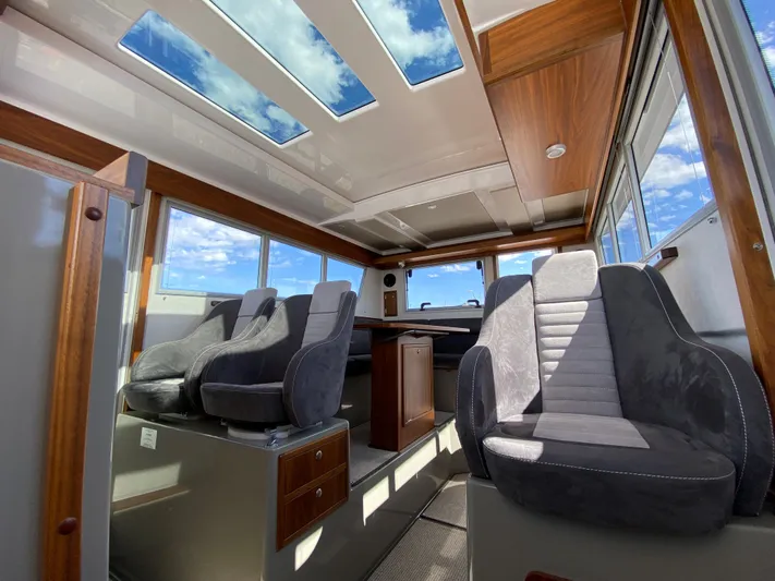 Ursa Yacht Photos Pics Interior of 2019 Sargo 36 Explorer boat with skylights and plush seating.