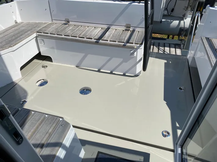 Ursa Yacht Photos Pics 2019 Sargo 36 Explorer boat deck with seating and stainless steel fixtures.