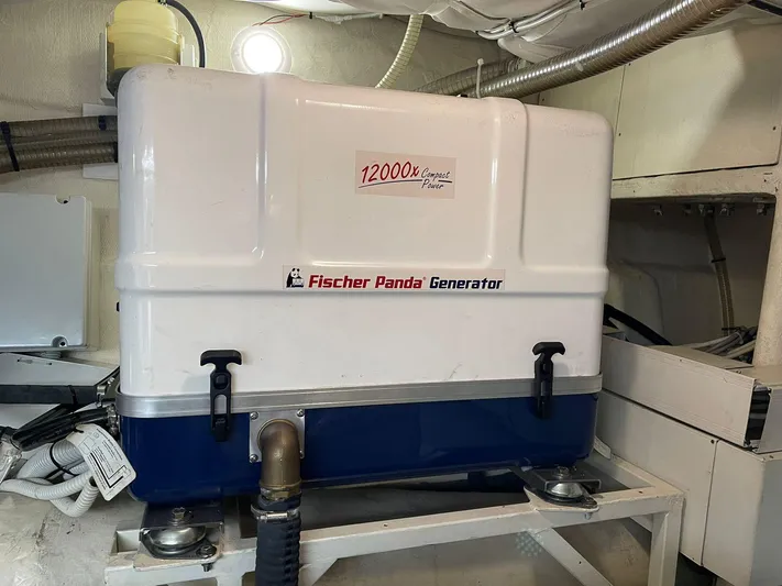  Yacht Photos Pics Fischer Panda generator inside a 2012 Ferretti Yachts 690 engine room.