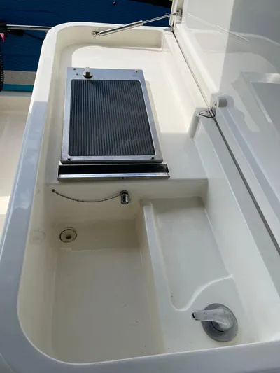  Yacht Photos Pics 2012 Ferretti Yachts 690 deck detail with built-in storage and grill.