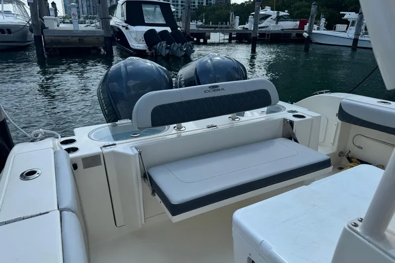 No Name Yacht Photos Pics 2018 Cobia 301 Center Console boat with dual engines docked at marina.
