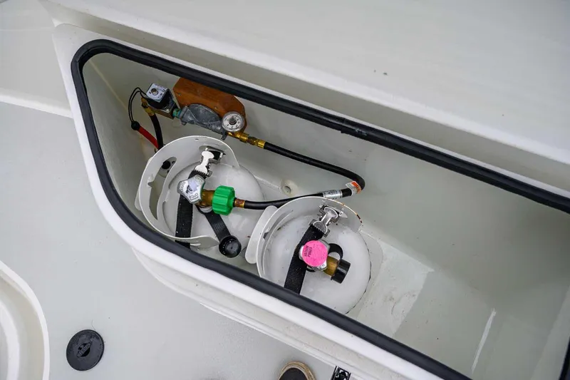  Yacht Photos Pics Storage compartment with gas cylinders on a 2024 Targa 27.2 boat.