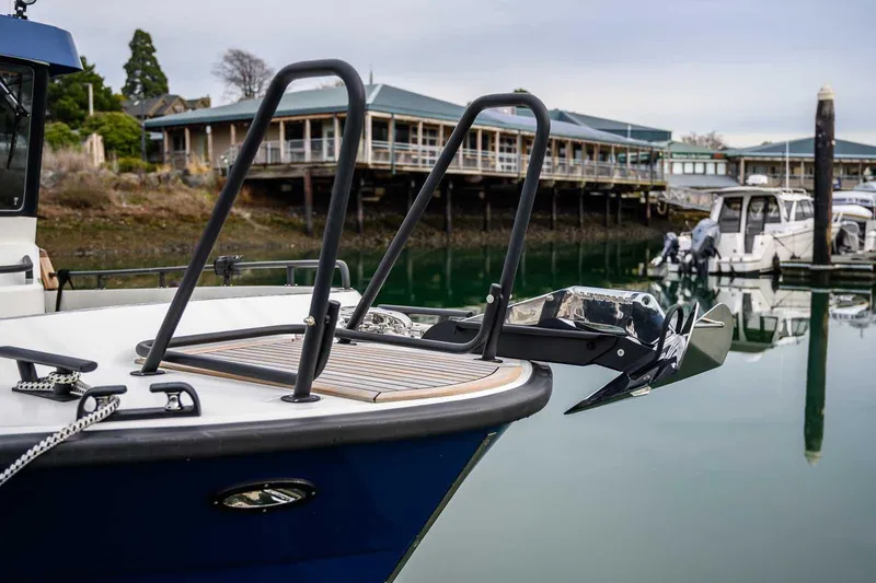  Yacht Photos Pics 2024 Targa 27.2 boat docked, featuring sleek design and modern anchor system.