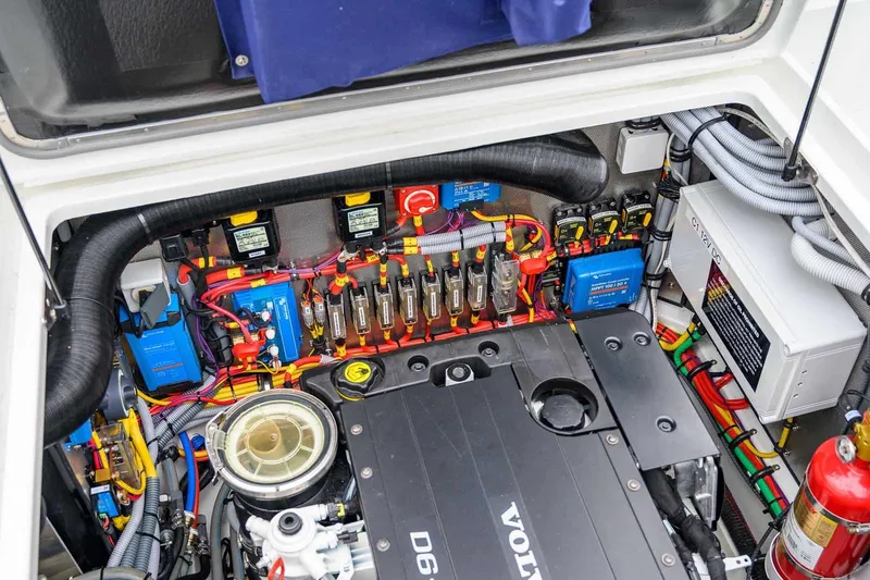  Yacht Photos Pics Engine compartment of 2024 Targa 27.2 boat, featuring Volvo Penta D6 engine and electrical components.