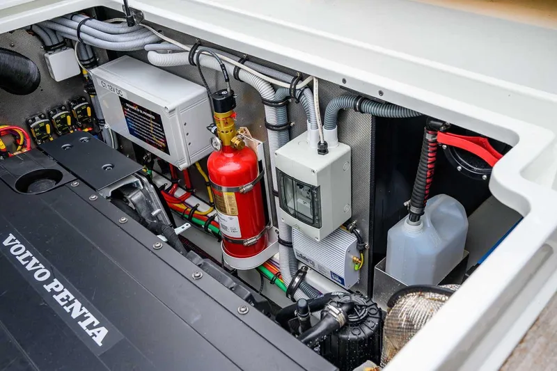  Yacht Photos Pics Engine compartment of 2024 Targa 27.2 boat featuring Volvo Penta engine and safety equipment.