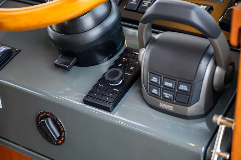 Yacht Photos Pics Control panel of 2024 Targa 27.2 boat featuring Volvo Penta throttle and navigation controls.