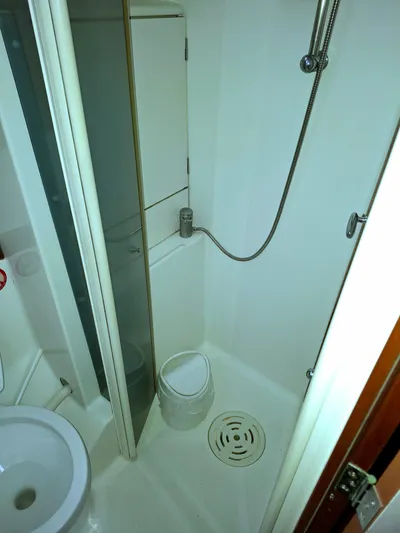  Yacht Photos Pics Bathroom of 2009 Beneteau Oceanis 54 yacht with shower and toilet.