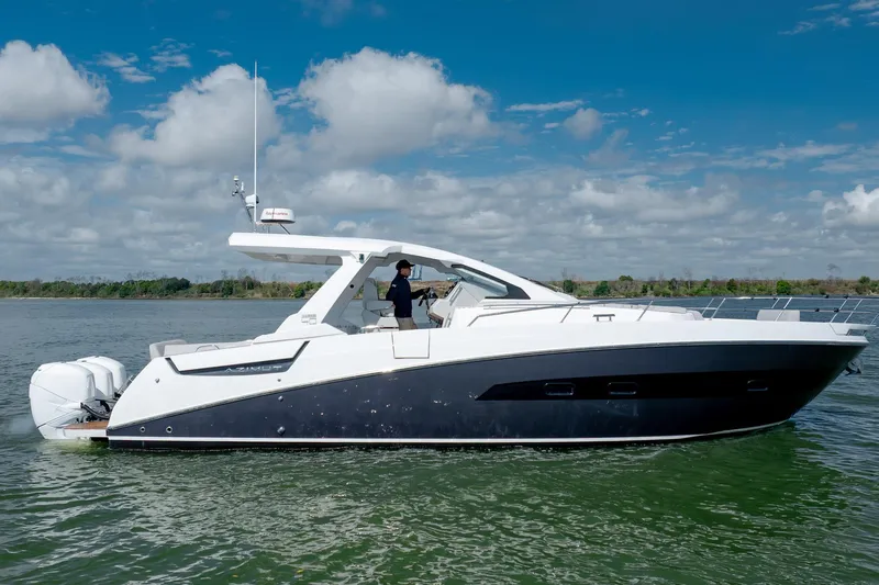  Yacht Photos Pics 2019 Azimut Verve 40 yacht cruising on a sunny day with clear skies.