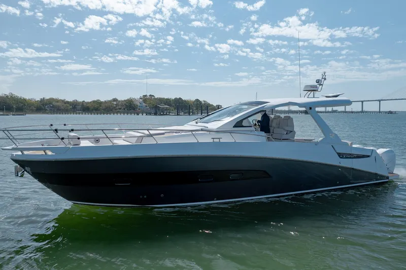  Yacht Photos Pics 2019 Azimut Verve 40 yacht cruising on a sunny day with scenic background.