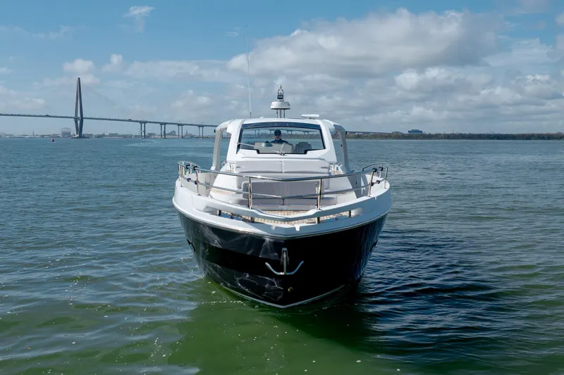  Yacht Photos Pics 2019 Azimut Verve 40 yacht on water with bridge in background.