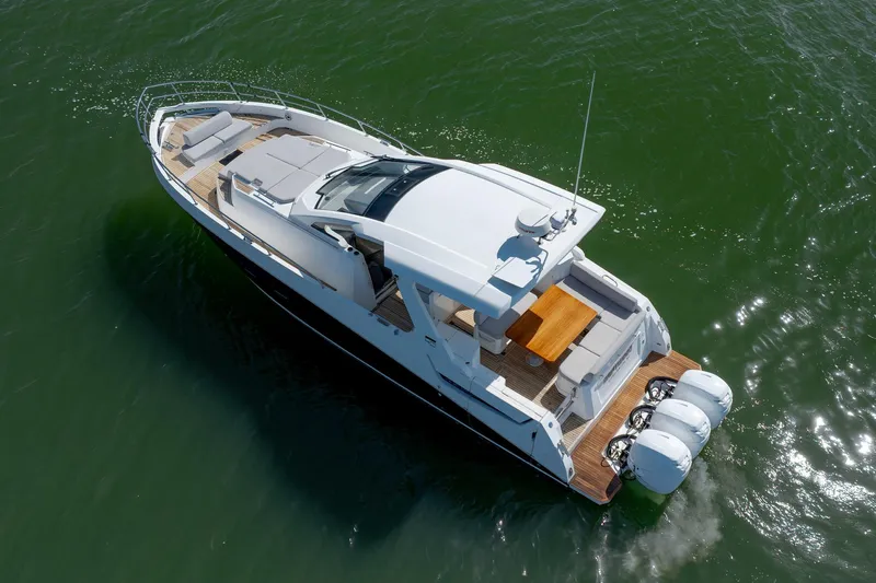  Yacht Photos Pics 2019 Azimut Verve 40 yacht cruising on open water, aerial view.