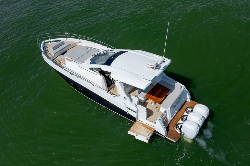  Yacht Photos Pics 2019 Azimut Verve 40 yacht cruising on green water, aerial view.