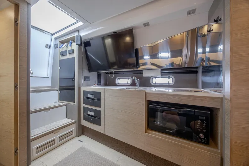  Yacht Photos Pics Luxurious interior of 2019 Azimut Verve 40 yacht with modern amenities and sleek design.