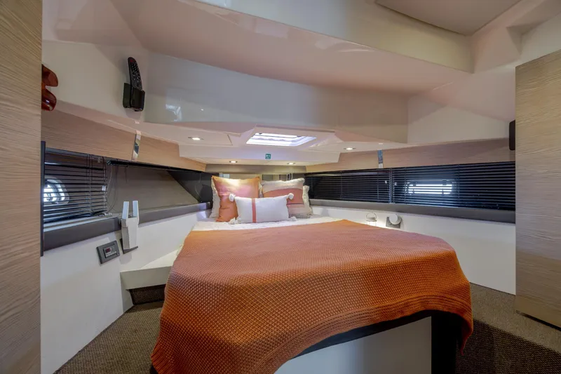  Yacht Photos Pics Luxurious 2019 Azimut Verve 40 yacht cabin with cozy bedding and modern design.