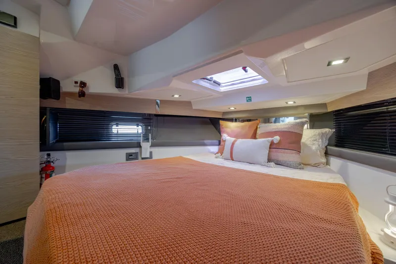  Yacht Photos Pics Luxurious cabin interior of 2019 Azimut Verve 40 yacht with cozy bedding.