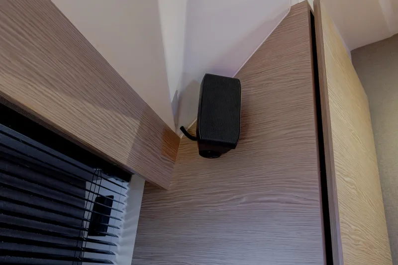  Yacht Photos Pics Speaker mounted on wooden panel inside 2019 Azimut Verve 40 yacht interior.