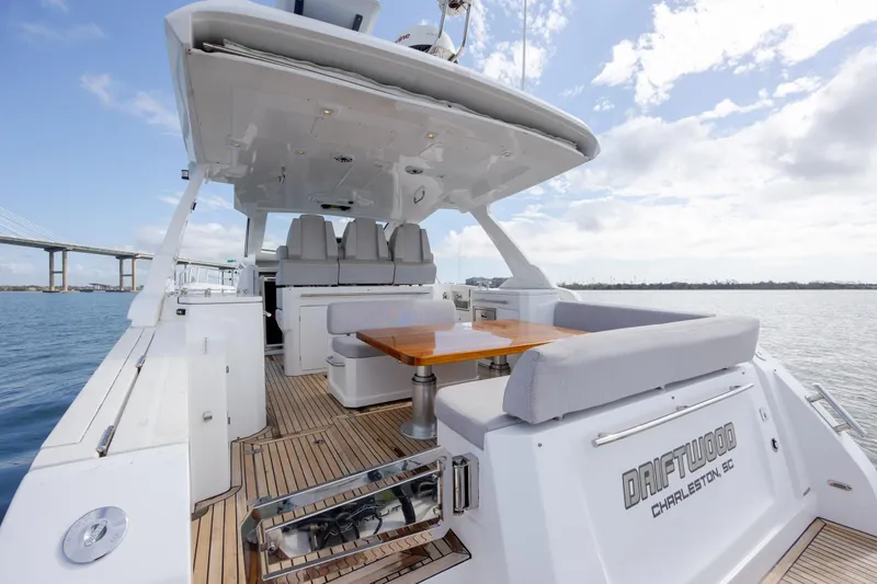  Yacht Photos Pics 2019 Azimut Verve 40 yacht with spacious deck and seating, cruising on calm waters.