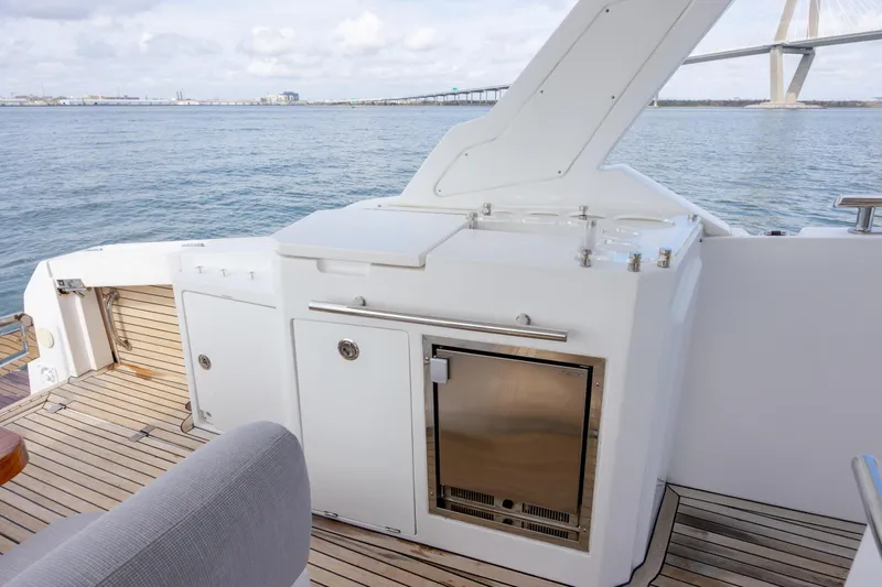  Yacht Photos Pics 2019 Azimut Verve 40 yacht deck with outdoor kitchen and ocean view.