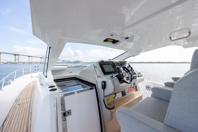  Yacht Photos Pics 2019 Azimut Verve 40 yacht cockpit with modern navigation system and ocean view.