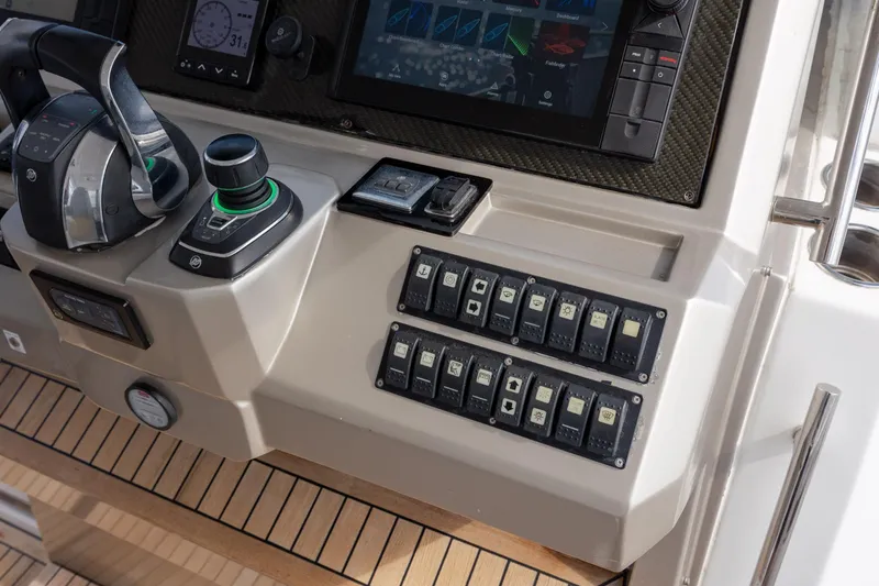 Yacht Photos Pics Control panel of 2019 Azimut Verve 40 yacht with switches and navigation display.
