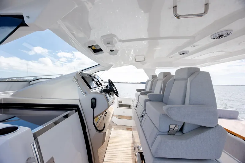  Yacht Photos Pics 2019 Azimut Verve 40 yacht interior with modern helm and seating.