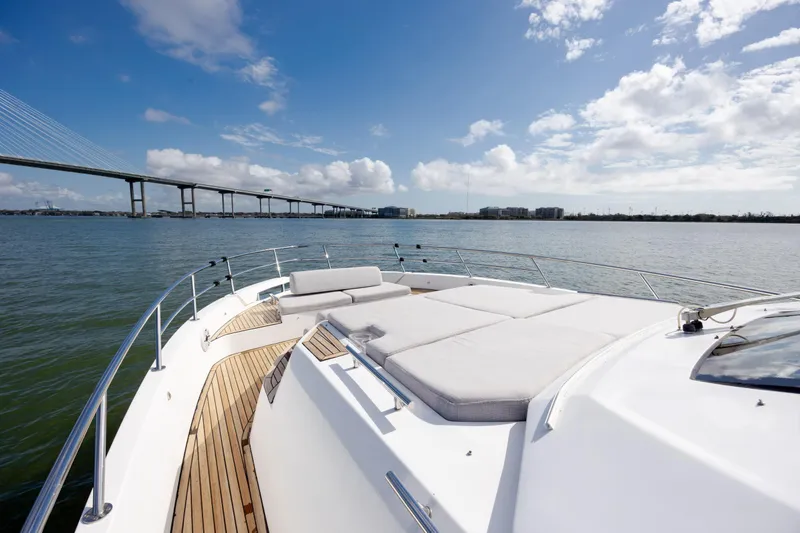  Yacht Photos Pics 2019 Azimut Verve 40 yacht with spacious deck, scenic bridge view, and clear blue sky.