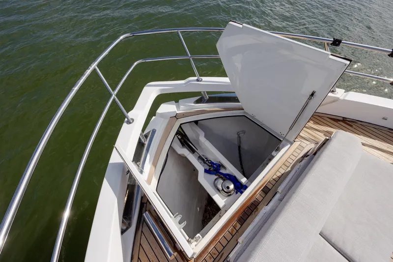  Yacht Photos Pics 2019 Azimut Verve 40 yacht anchor compartment with open hatch, showing storage details.