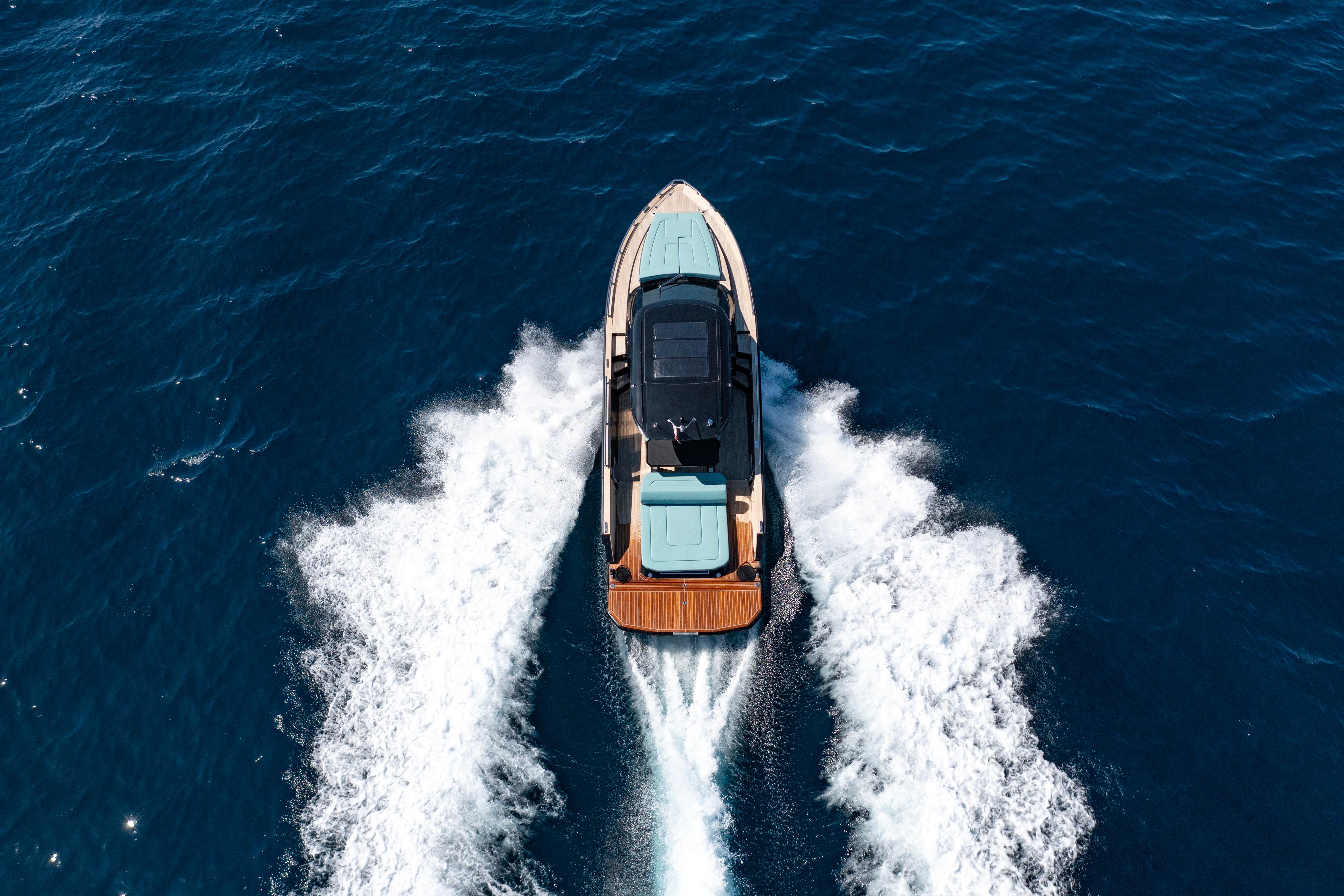 Aerial view of 2023 Focus Forza 37 yacht cruising on open blue sea.
